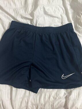 navy blue nike soccer shorts kids L/womens XS